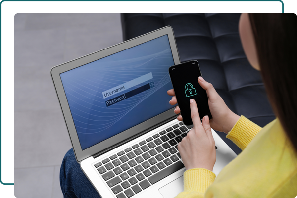 Woman securely logging into her laptop and phone