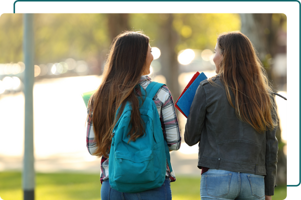 Two students walking to class