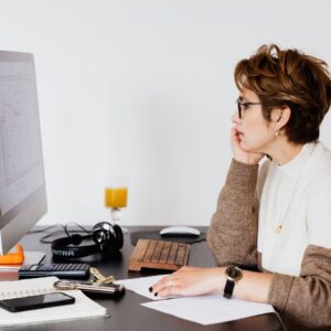 university admissions employee looking at reports